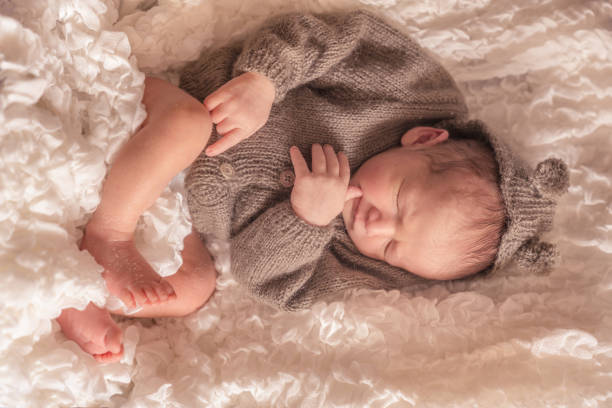istock Newborn baby Sleeping in Wooden Basket 1226770853
