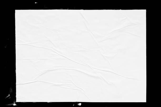 Paper poster mockup isolated on black background Paper poster mockup isolated on black background. Blank glued creased paper sheet texture wild posting ad stock pictures, royalty-free photos & images