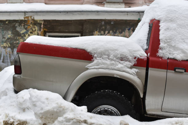 istock car wheel stuck in the snow 1226774728