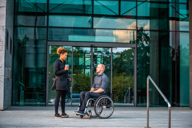 istock Business Partners Conversing Outdoors on Coffee Break 1226774926