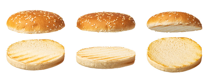 Burger bun cut in two isolated on white background