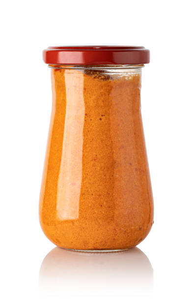 istock red basil pesto sauce in glass jar 1226775315