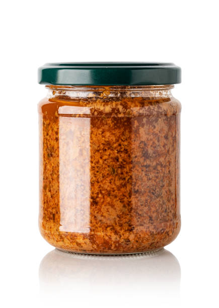 istock red basil pesto sauce in glass jar 1226775339
