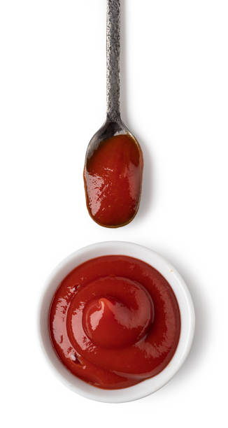 istock Bowl and spoon with ketchup sauce 1226775373