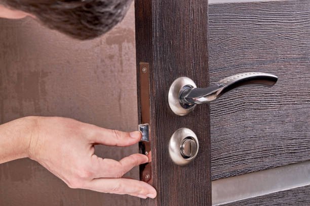 istock person fixing door furniture. improvement process. 1226777515