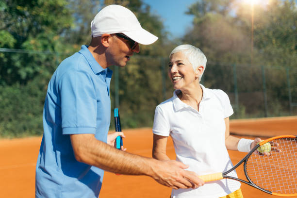 istock Mature Woman Playing Tennis 1226783617