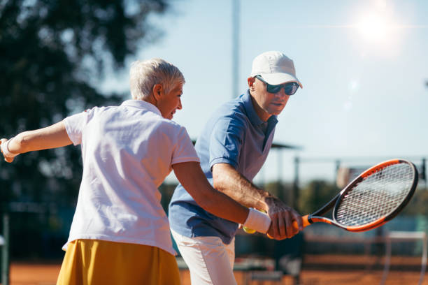 istock Beautiful Mature Active Woman Playing Tennis 1226784514