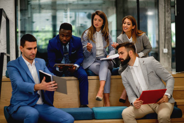 istock Group of young professionals having a meeting 1226786776