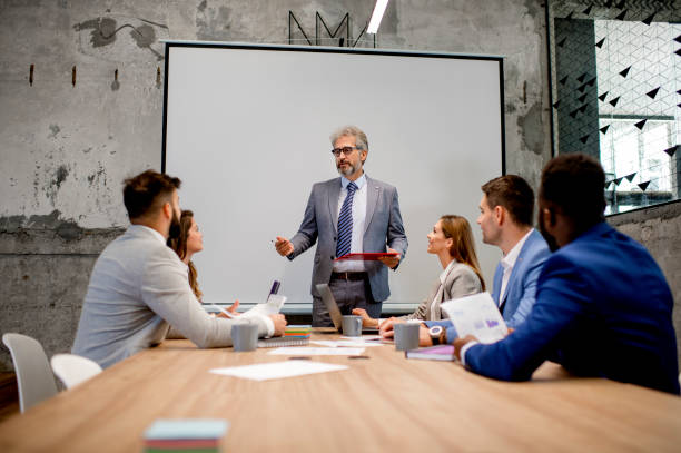 istock Business people discussing in board room 1226788682