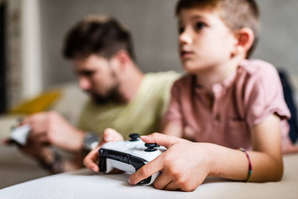 istock Playing video games with my dad 1226788898