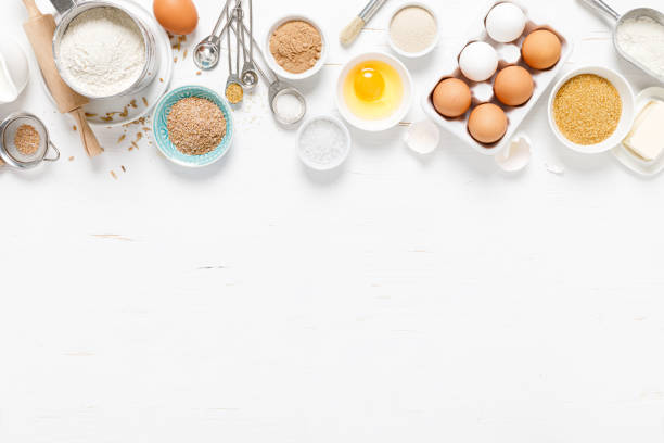istock Baking homemade bread on white kitchen worktop with ingredients for cooking, culinary background, copy space, overhead view 1226789191