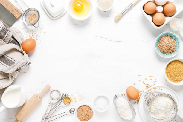 istock Baking homemade bread on white kitchen worktop with ingredients for cooking, culinary background, copy space, overhead view 1226789212