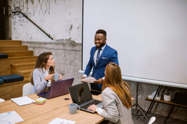 istock Young businessman sharing ideas in office 1226791112