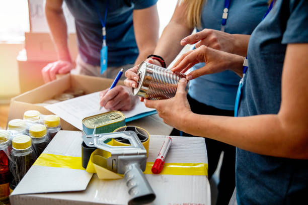 istock Unrecognizable volunteers working to help people 1226791684