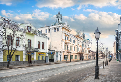 The building of the Chernoyarovsky passage in Kazan on Kremlin street under a blue sky
