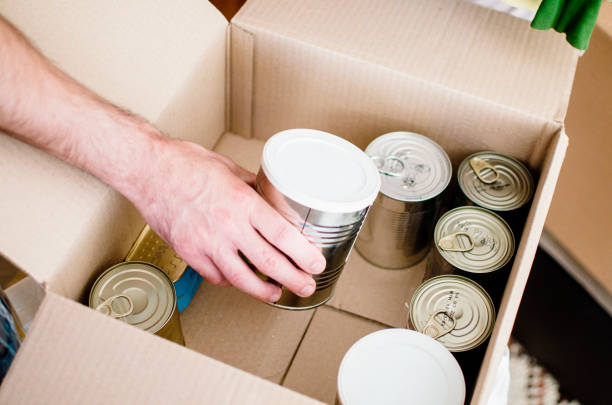 istock Making Donations To Community Food Bank 1226792034
