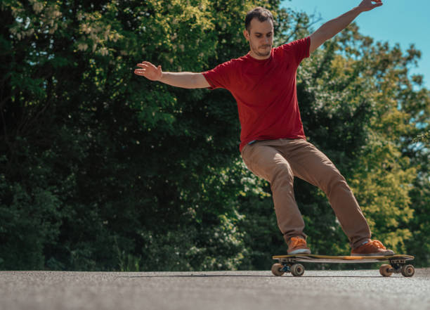 istock Longboard rider riding downhill 1226792164