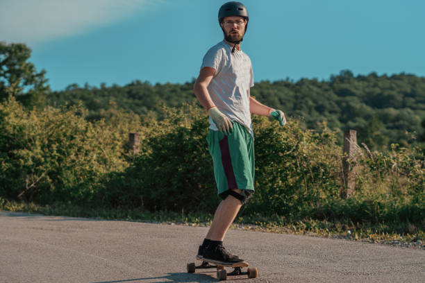 istock Longboard rider riding downhill 1226792240