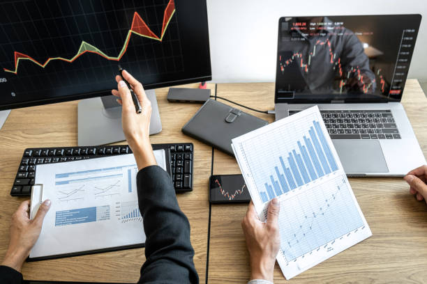 istock Business team investment working with computer, planning and analyzing graph stock market trading with stock chart data, business financial investment planning concept 1226793531
