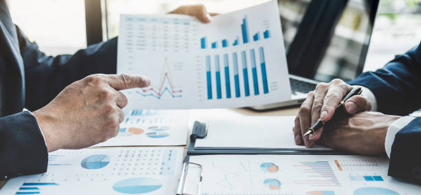 istock Finance manager meeting discussing company growth project success financial statistics, professional investor working start up project for strategy plan with document, laptop and digital tablet 1226793572