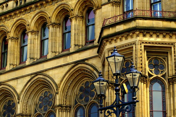 Victorian town hall building and vintage street lamps
