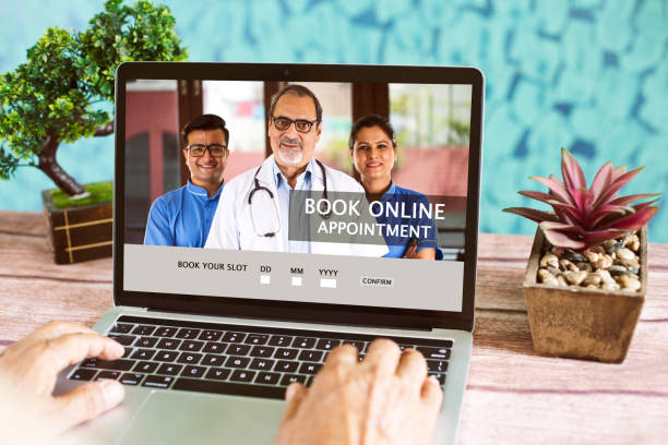 istock Man Booking online appointment with doctors using laptop at home 1226795263
