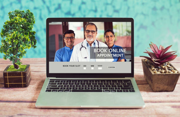 istock Booking online appointment with doctors on laptop at home 1226795297
