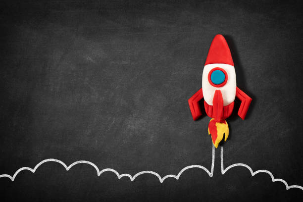 business startup concept with spaceship on blackboard - ideas inspiration innovation new business imagens e fotografias de stock