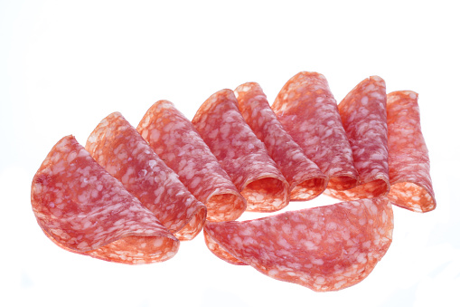 Slices of salami - white background