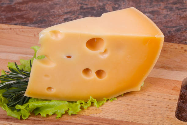 istock Maasdam cheese  in the board served salad leaves 1226799796