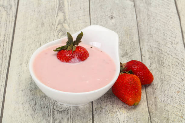 istock Yoghurt with strawberry in the bowl 1226802671