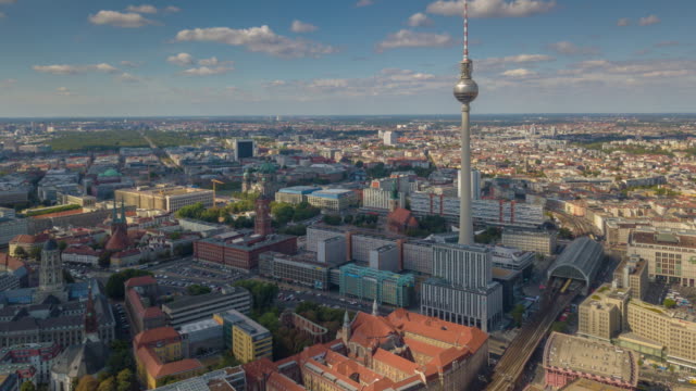 sunset light evening flight over berlin cityscape famous tv tower aerial panorama 4k timelapse germany