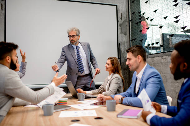 istock Business people discussing in board room 1226803236