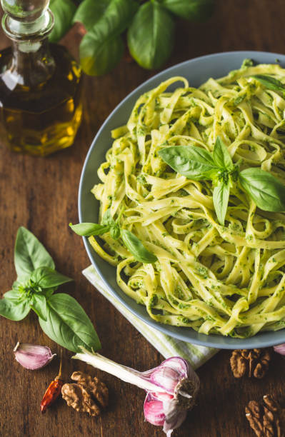 istock Tagliatelle pasta with pesto sauce 1226805358