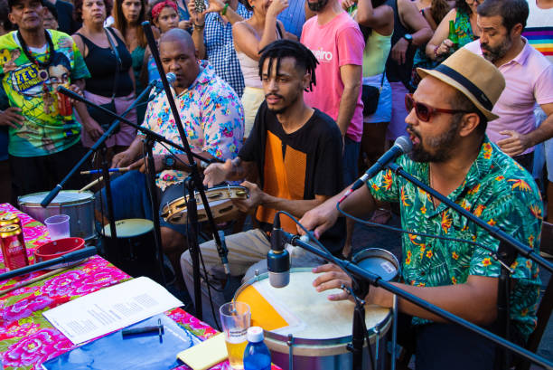 People playing samba at downtown of Rio de Janeiro Rio de Janeiro, Brazil, 02 december, 2019: People playing samba at downtown of Rio de Janeiro samba dancing stock pictures, royalty-free photos & images