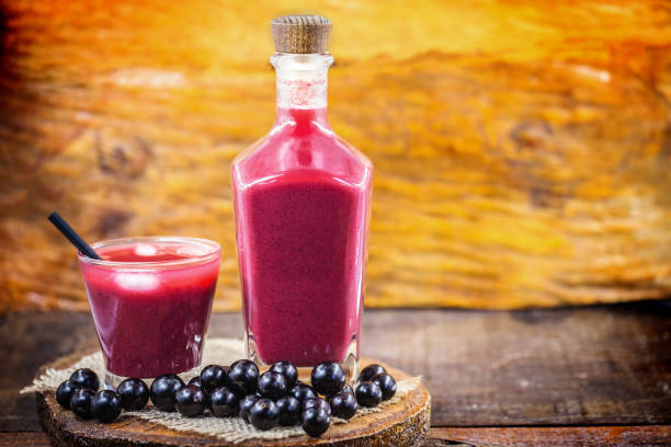 istock Jabuticaba juice, fruit also known as jaboticaba. Natural and organic juice, extracted directly from the fruit. Brazilian exotic fruit juice. 1226808524