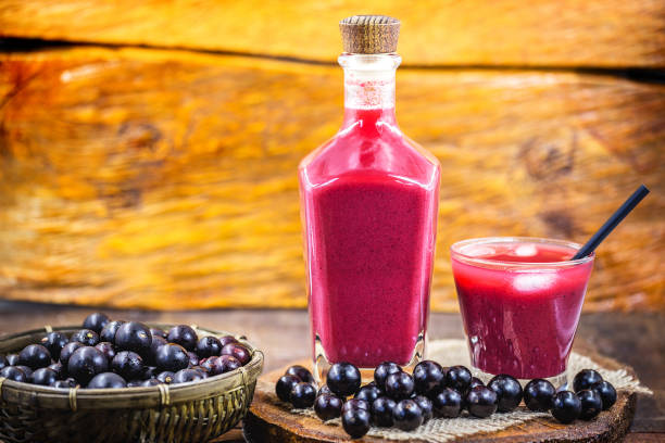 istock Jabuticaba juice, fruit also known as jaboticaba. Natural and organic juice, extracted directly from the fruit. Brazilian exotic fruit juice. 1226808581