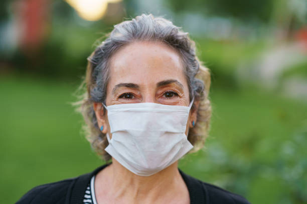 istock Senior Woman Wearing Mask 1226809406