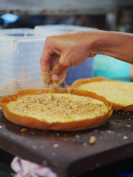 istock The process of making sweet martabak (terang bulan). A series 1226809642