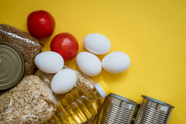 istock Food delivery on a yellow background, eggs and cere 1226809800
