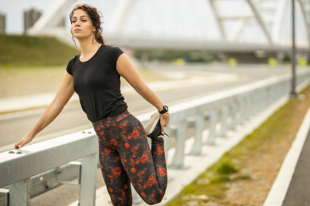 istock Woman stretching after running 1226811951
