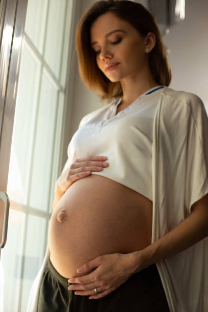 istock Peaceful young lady expecting a baby to be born 1226812044