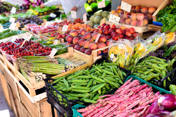 istock Fresh vegetables and fruits on market stall. Selective focus. 1226812914