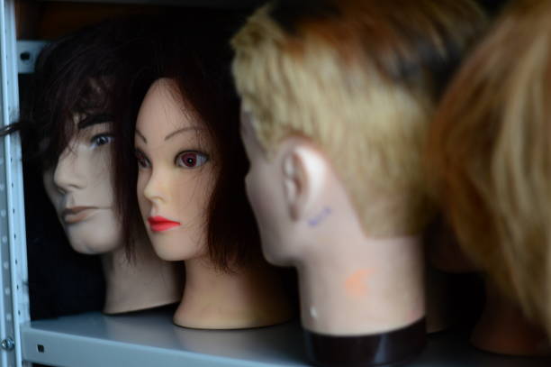 istock beautiful multi-colored wigs stand on a shelf 1226815008
