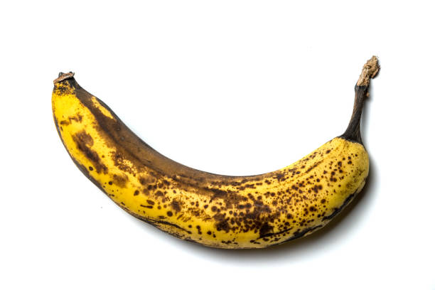 istock old banana with spots, on a white isolated background. Horizontal frame 1226819662