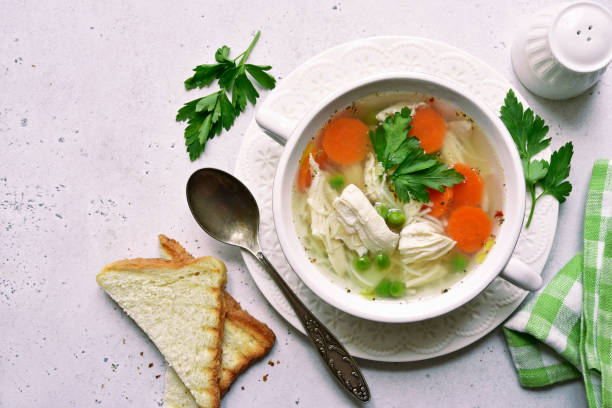 istock Chicken soup with vegetable in a white bowl 1226822745