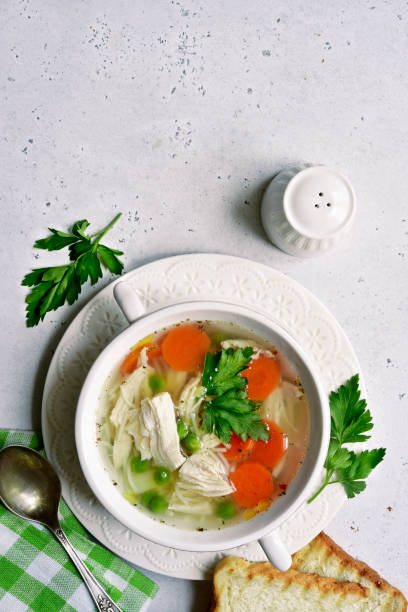 istock Chicken soup with vegetable in a white bowl 1226822837