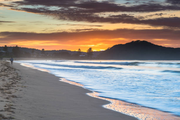istock Colourful Sunrise at the Beach with Clouds 1226822980