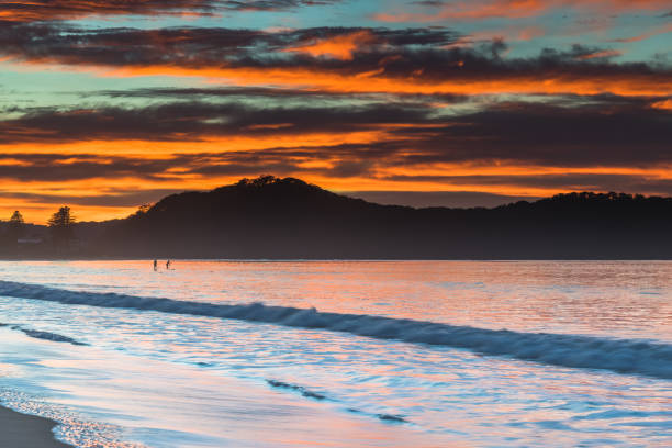 istock Colourful Sunrise at the Beach with Clouds 1226823012