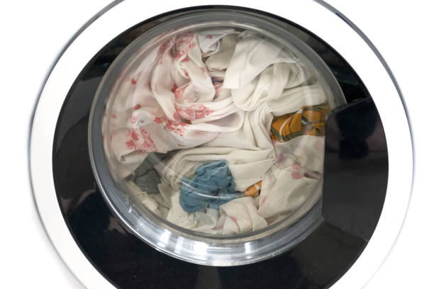 istock A washing machine that works in the spinning process, wring the laundry, 1226825212